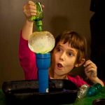 Child experimenting with science