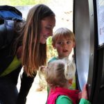 Kids at cascade wall exhibit