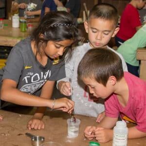 School children experimenting