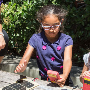 Girl with solar meter